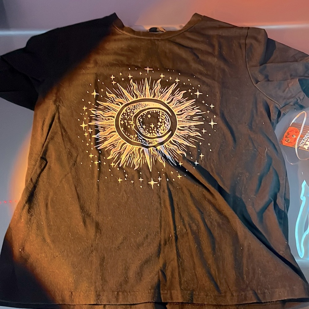 From SHEIN  size small sun/star shirt very comfortable and still in good shape.